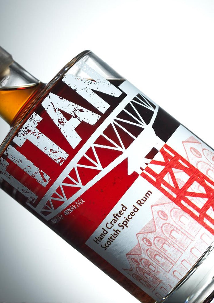Angled close-up of the Titan Hand Crafted Scottish Spiced Rum label